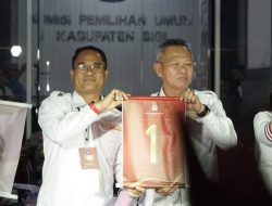 Nomor urut 1 Simbol Keberuntungan Pasangan Rizal Intjenae dan Samuel Yansen Pongi